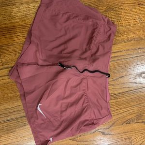 Pink nike running shorts
